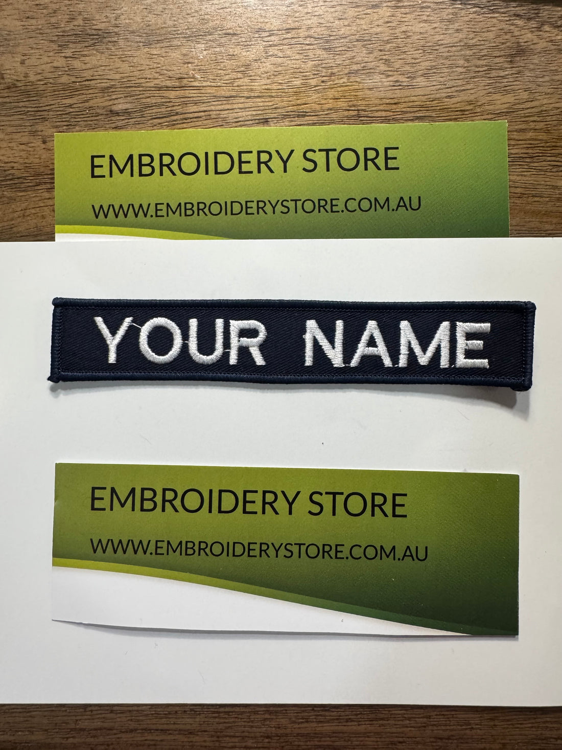 EMBROIDERED PERSONALISED NAME TAG WHITE ON BLUE